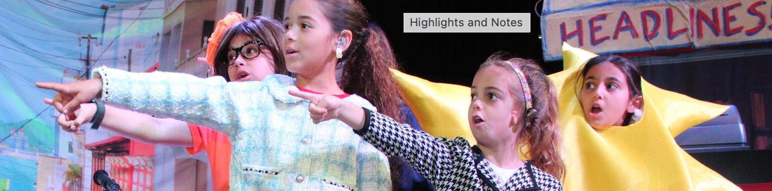 four young girls perform onstage